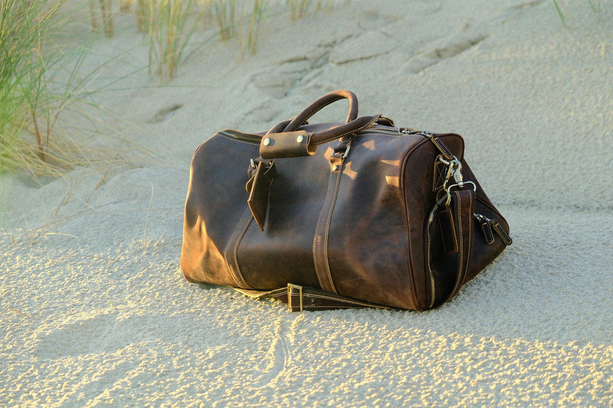 COFFT leather duffle bag packed for a weekend trip